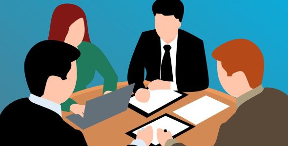 4 people discussing together